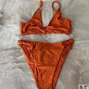 Rust Orange Bikini Set brand. We never used.